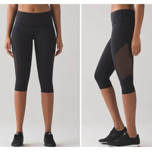 Lululemon Reveal Crop in Black. Mesh Sides. Size 12 or XL